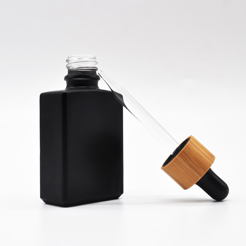 Wholesale Square Glass Essential Oil Tincture Bottles with Bamboo Dropper 1 OZ Black Rectangle Cheap Price For Sale