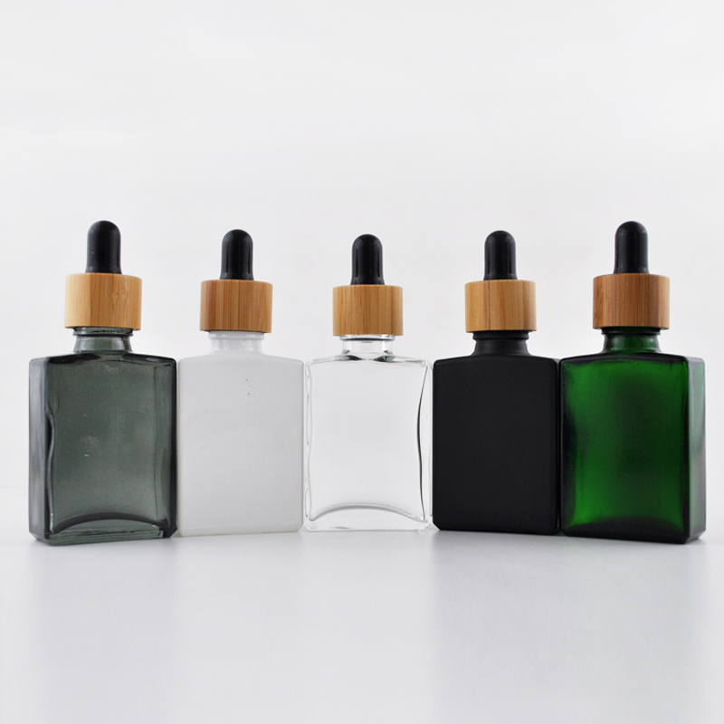Wholesale Square Glass Essential Oil Tincture Bottles with Bamboo Dropper 1 OZ Black Rectangle Cheap Price For Sale