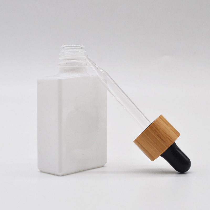 Wholesale Square Glass Essential Oil Tincture Bottles with Bamboo Dropper 1 OZ Black Rectangle Cheap Price For Sale