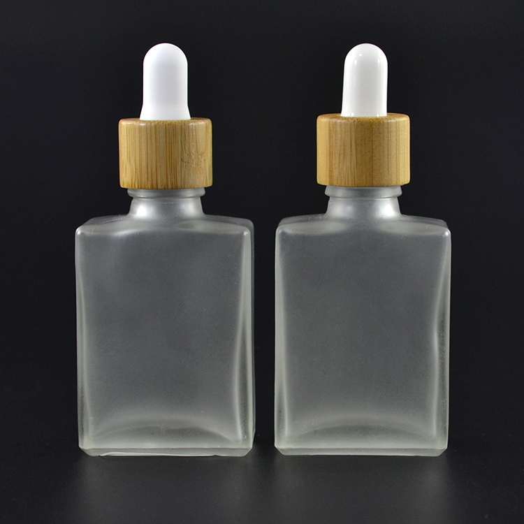 Wholesale Square Glass Essential Oil Tincture Bottles with Bamboo Dropper 1 OZ Black Rectangle Cheap Price For Sale