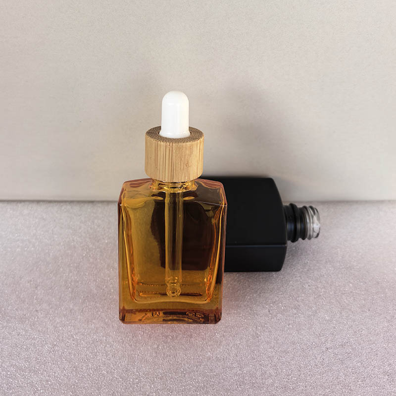 Wholesale Glass Dropper Bottles Matte Black Clear Frosted White Green Orange Cobalt Blue Rose Gold Silver 1 2 OZ 2OZ 30ML